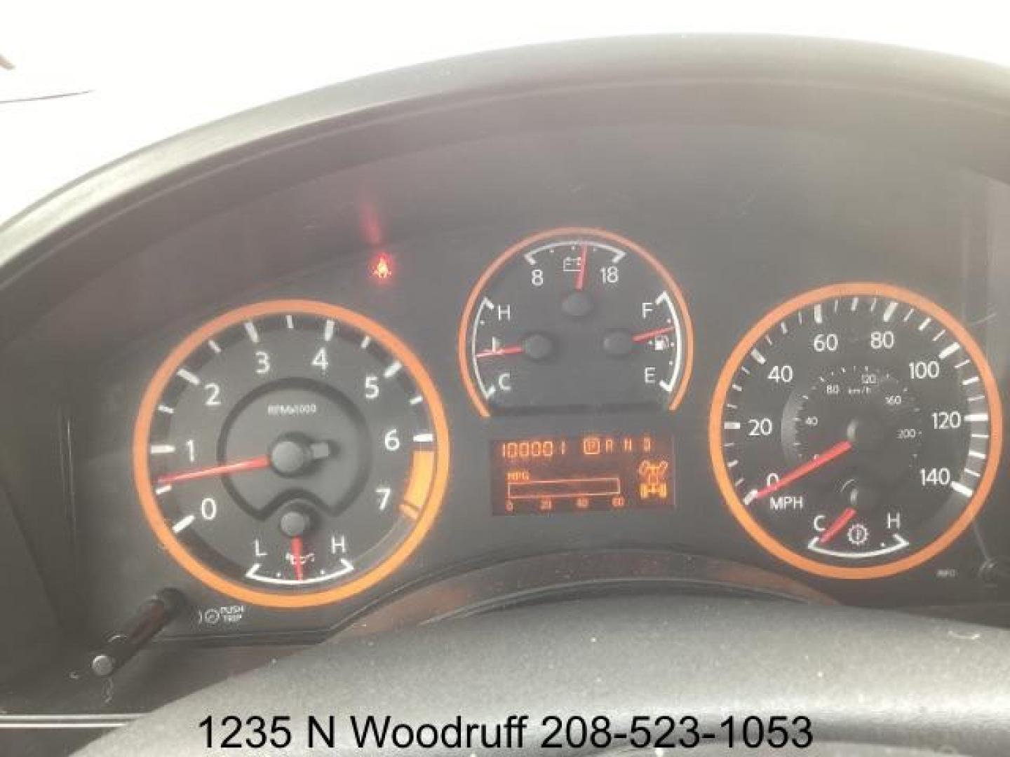 2014 Cayenne Red Metallic /Charcoal Nissan Titan SL Crew Cab 4WD (1N6AA0EC1EN) with an 5.6L V8 DOHC 32V engine, 5-Speed Automatic transmission, located at 1235 N Woodruff Ave., Idaho Falls, 83401, (208) 523-1053, 43.507172, -112.000488 - At Timberline Auto, finding a great deal on your next vehicle is always easy! Our experienced sales staff's goal is to help find you the right vehicle at the right price! Our knowledgeable finance department has options for almost any credit score. We offer extended service contract options to prote - Photo#13