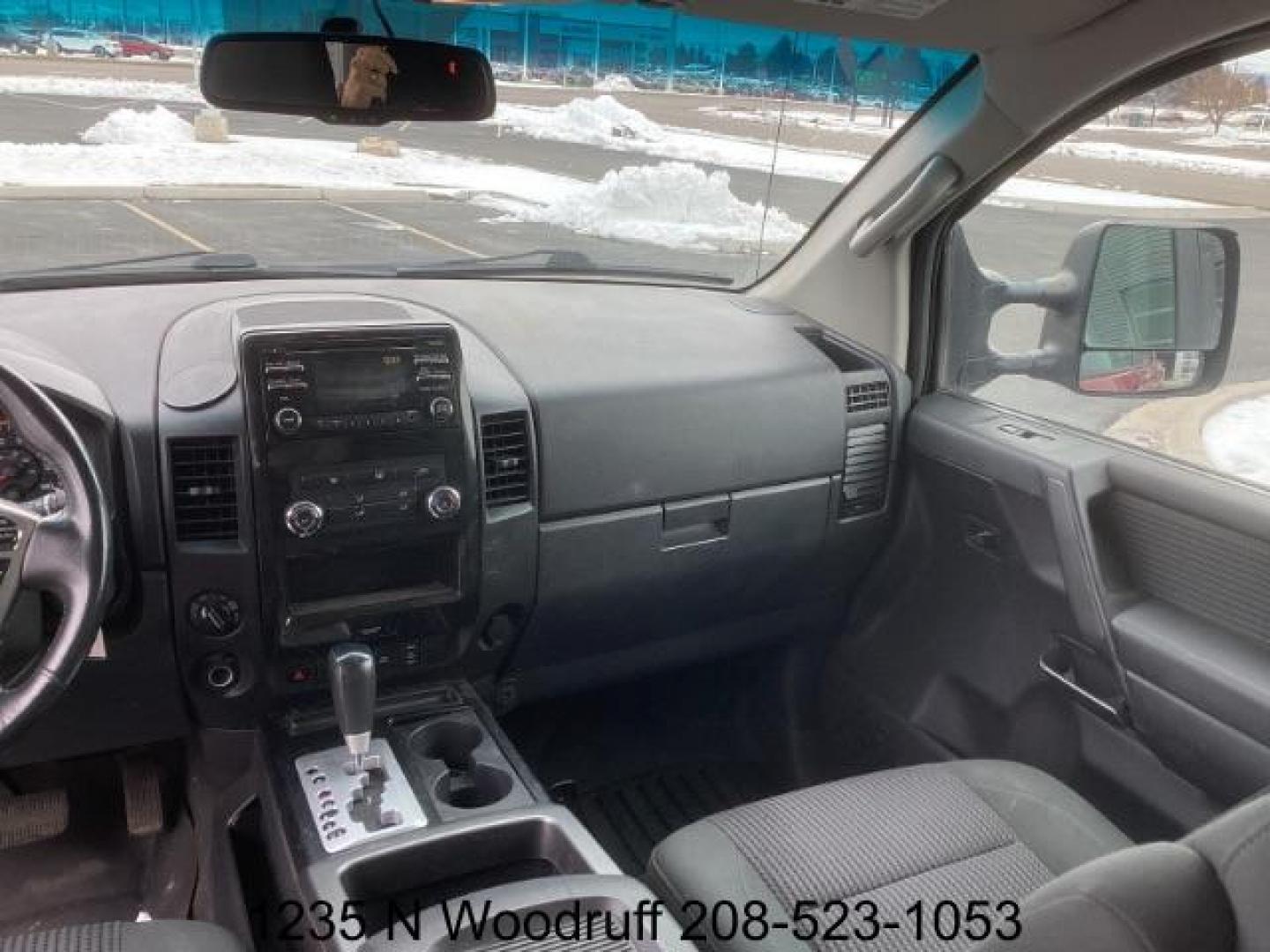 2014 Cayenne Red Metallic /Charcoal Nissan Titan SL Crew Cab 4WD (1N6AA0EC1EN) with an 5.6L V8 DOHC 32V engine, 5-Speed Automatic transmission, located at 1235 N Woodruff Ave., Idaho Falls, 83401, (208) 523-1053, 43.507172, -112.000488 - At Timberline Auto, finding a great deal on your next vehicle is always easy! Our experienced sales staff's goal is to help find you the right vehicle at the right price! Our knowledgeable finance department has options for almost any credit score. We offer extended service contract options to prote - Photo#14