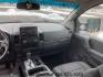 2014 Cayenne Red Metallic /Charcoal Nissan Titan SL Crew Cab 4WD (1N6AA0EC1EN) with an 5.6L V8 DOHC 32V engine, 5-Speed Automatic transmission, located at 1235 N Woodruff Ave., Idaho Falls, 83401, (208) 523-1053, 43.507172, -112.000488 - At Timberline Auto, finding a great deal on your next vehicle is always easy! Our experienced sales staff's goal is to help find you the right vehicle at the right price! Our knowledgeable finance department has options for almost any credit score. We offer extended service contract options to prote - Photo#14