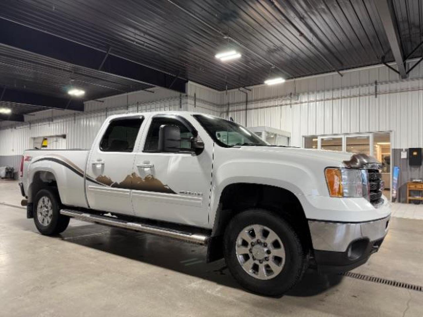 2012 Summit White /Ebony Leather Interior GMC Sierra 2500HD SLT Crew Cab 4WD (1GT121E8XCF) with an 6.6L V8 OHV 32V TURBO DIESEL engine, 6-Speed Automatic transmission, located at 1235 N Woodruff Ave., Idaho Falls, 83401, (208) 523-1053, 43.507172, -112.000488 - At Timberline Auto, finding a great deal on your next vehicle is always easy! Our experienced sales staff's goal is to help find you the right vehicle at the right price! Our knowledgeable finance department has options for almost any credit score. We offer extended service contract options to prote - Photo#5
