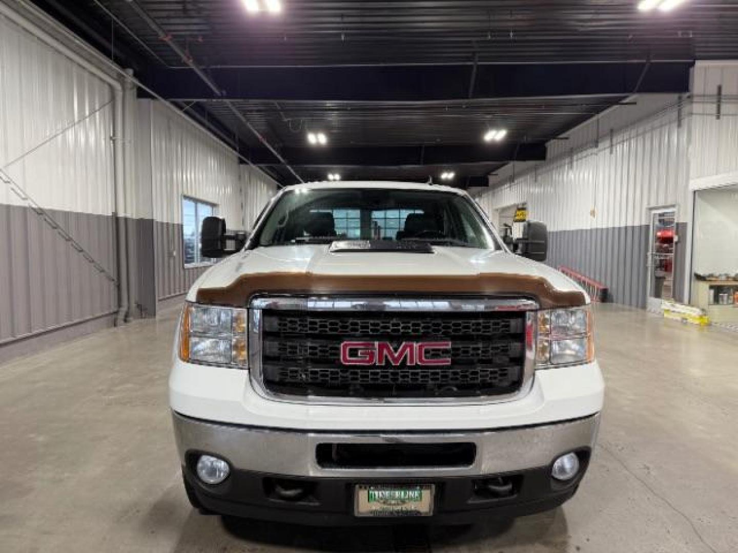 2012 Summit White /Ebony Leather Interior GMC Sierra 2500HD SLT Crew Cab 4WD (1GT121E8XCF) with an 6.6L V8 OHV 32V TURBO DIESEL engine, 6-Speed Automatic transmission, located at 1235 N Woodruff Ave., Idaho Falls, 83401, (208) 523-1053, 43.507172, -112.000488 - At Timberline Auto, finding a great deal on your next vehicle is always easy! Our experienced sales staff's goal is to help find you the right vehicle at the right price! Our knowledgeable finance department has options for almost any credit score. We offer extended service contract options to prote - Photo#6