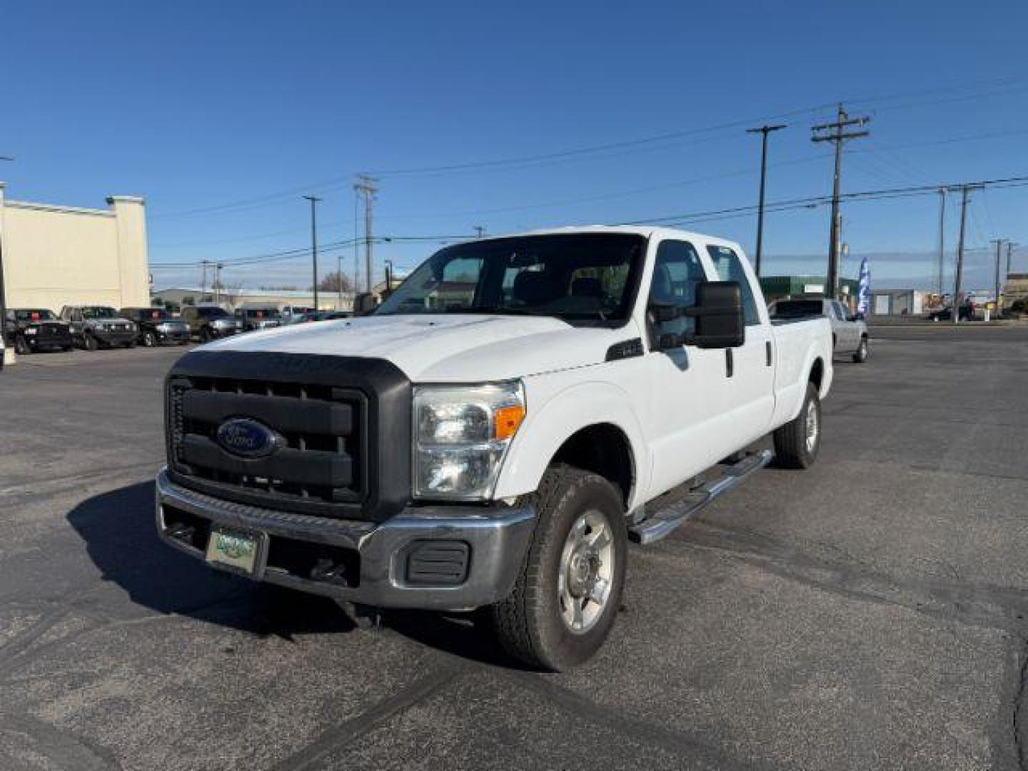 2012 Oxford White /Steel Cloth Interior Ford F-250 SD XLT Crew Cab Long Bed 4WD (1FT7W2B63CE) with an 6.2L V8 OHV 16V engine, 6-Speed Automatic transmission, located at 1235 N Woodruff Ave., Idaho Falls, 83401, (208) 523-1053, 43.507172, -112.000488 - At Timberline Auto, finding a great deal on your next vehicle is always easy! Our experienced sales staff's goal is to help find you the right vehicle at the right price! Our knowledgeable finance department has options for almost any credit score. We offer extended service contract options to prote - Photo#0