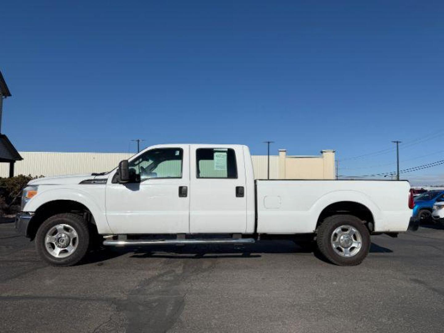 2012 Oxford White /Steel Cloth Interior Ford F-250 SD XLT Crew Cab Long Bed 4WD (1FT7W2B63CE) with an 6.2L V8 OHV 16V engine, 6-Speed Automatic transmission, located at 1235 N Woodruff Ave., Idaho Falls, 83401, (208) 523-1053, 43.507172, -112.000488 - At Timberline Auto, finding a great deal on your next vehicle is always easy! Our experienced sales staff's goal is to help find you the right vehicle at the right price! Our knowledgeable finance department has options for almost any credit score. We offer extended service contract options to prote - Photo#1