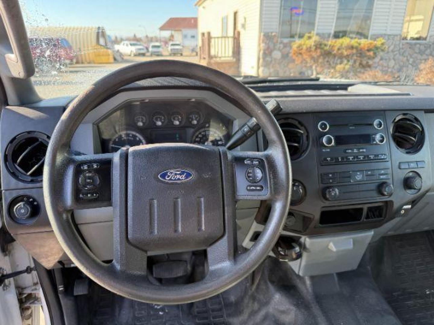 2012 Oxford White /Steel Cloth Interior Ford F-250 SD XLT Crew Cab Long Bed 4WD (1FT7W2B63CE) with an 6.2L V8 OHV 16V engine, 6-Speed Automatic transmission, located at 1235 N Woodruff Ave., Idaho Falls, 83401, (208) 523-1053, 43.507172, -112.000488 - At Timberline Auto, finding a great deal on your next vehicle is always easy! Our experienced sales staff's goal is to help find you the right vehicle at the right price! Our knowledgeable finance department has options for almost any credit score. We offer extended service contract options to prote - Photo#8