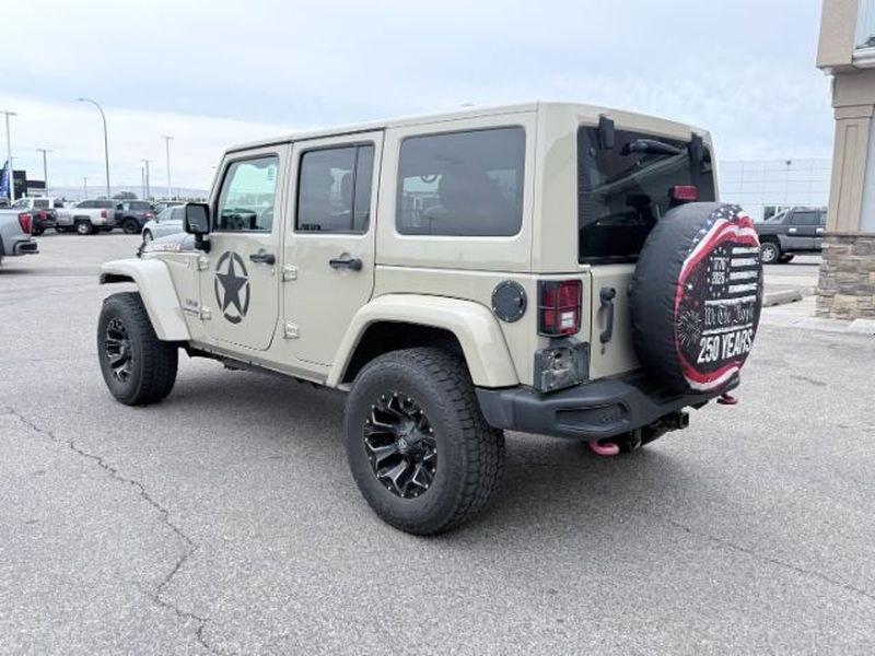2018 TAN /Black Jeep Wrangler Rubicon (1C4BJWFG4JL) with an V6, 3.6L engine, 6-speed manual transmission, located at 1175 N Woodruff Ave, Idaho Falls, ID, 83401, 43.506901, -111.999657 - <b>Vehicle Details</b><br>Adventure-ready and built to conquer, this 2018 Jeep Wrangler Unlimited Rubicon in Idaho Falls, ID delivers legendary off-road capability with rugged style and everyday comfort. Powered by a strong V6, 3.6L gasoline engine and equipped with 4WD, this Jeep Wrangler is engine- Photo#2