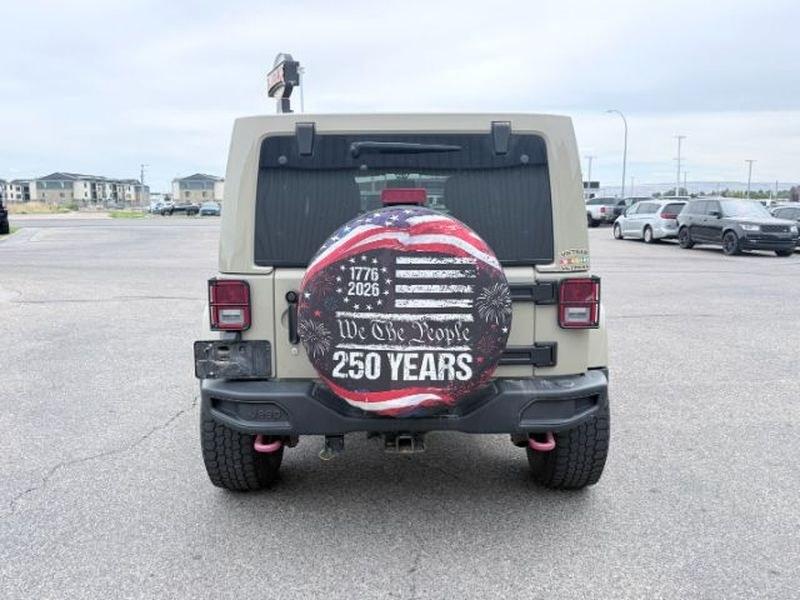 2018 TAN /Black Jeep Wrangler Rubicon (1C4BJWFG4JL) with an V6, 3.6L engine, 6-speed manual transmission, located at 1175 N Woodruff Ave, Idaho Falls, ID, 83401, 43.506901, -111.999657 - <b>Vehicle Details</b><br>Adventure-ready and built to conquer, this 2018 Jeep Wrangler Unlimited Rubicon in Idaho Falls, ID delivers legendary off-road capability with rugged style and everyday comfort. Powered by a strong V6, 3.6L gasoline engine and equipped with 4WD, this Jeep Wrangler is engine- Photo#3