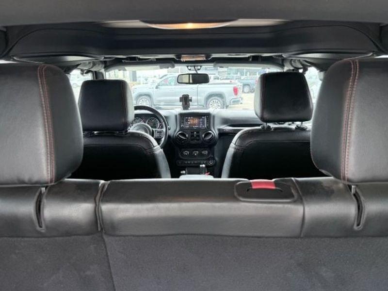 2018 TAN /Black Jeep Wrangler Rubicon (1C4BJWFG4JL) with an V6, 3.6L engine, 6-speed manual transmission, located at 1175 N Woodruff Ave, Idaho Falls, ID, 83401, 43.506901, -111.999657 - <b>Vehicle Details</b><br>Adventure-ready and built to conquer, this 2018 Jeep Wrangler Unlimited Rubicon in Idaho Falls, ID delivers legendary off-road capability with rugged style and everyday comfort. Powered by a strong V6, 3.6L gasoline engine and equipped with 4WD, this Jeep Wrangler is engine- Photo#5