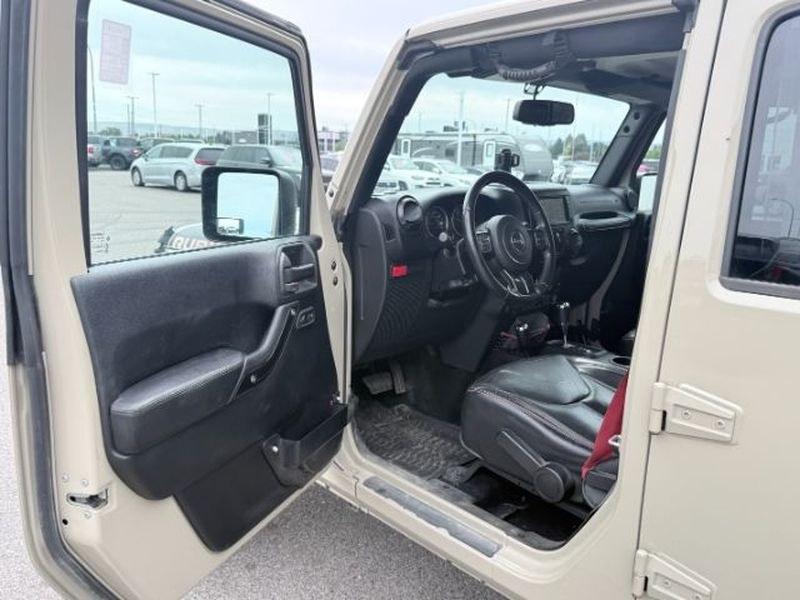 2018 TAN /Black Jeep Wrangler Rubicon (1C4BJWFG4JL) with an V6, 3.6L engine, 6-speed manual transmission, located at 1175 N Woodruff Ave, Idaho Falls, ID, 83401, 43.506901, -111.999657 - <b>Vehicle Details</b><br>Adventure-ready and built to conquer, this 2018 Jeep Wrangler Unlimited Rubicon in Idaho Falls, ID delivers legendary off-road capability with rugged style and everyday comfort. Powered by a strong V6, 3.6L gasoline engine and equipped with 4WD, this Jeep Wrangler is engine- Photo#12