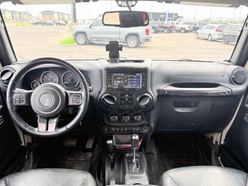 2018 TAN /Black Jeep Wrangler Rubicon (1C4BJWFG4JL) with an V6, 3.6L engine, 6-speed manual transmission, located at 1175 N Woodruff Ave, Idaho Falls, ID, 83401, 43.506901, -111.999657 - <b>Vehicle Details</b><br>Adventure-ready and built to conquer, this 2018 Jeep Wrangler Unlimited Rubicon in Idaho Falls, ID delivers legendary off-road capability with rugged style and everyday comfort. Powered by a strong V6, 3.6L gasoline engine and equipped with 4WD, this Jeep Wrangler is engine- Photo#23