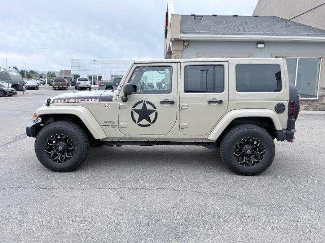 2018 TAN /Black, cloth Jeep Wrangler JK Unlimited Rubicon 4WD (1C4BJWFG4JL) with an 3.6L V6 DOHC 24V FFV engine, 6-Speed Automatic transmission, located at 1235 N Woodruff Ave., Idaho Falls, 83401, (208) 523-1053, 43.507172, -112.000488 - At Timberline Auto, finding a great deal on your next vehicle is always easy! Our experienced sales staff goal is to help find you the right vehicle at the right price! Our knowledgeable finance department has options for almost any credit score. We offer extended service contract options to prot- Photo#1