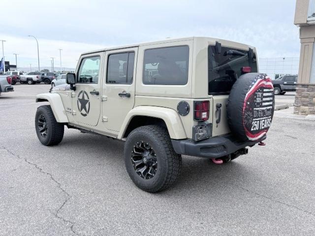 2018 TAN /Black, cloth Jeep Wrangler JK Unlimited Rubicon 4WD (1C4BJWFG4JL) with an 3.6L V6 DOHC 24V FFV engine, 6-Speed Automatic transmission, located at 1235 N Woodruff Ave., Idaho Falls, 83401, (208) 523-1053, 43.507172, -112.000488 - At Timberline Auto, finding a great deal on your next vehicle is always easy! Our experienced sales staff goal is to help find you the right vehicle at the right price! Our knowledgeable finance department has options for almost any credit score. We offer extended service contract options to prot- Photo#2