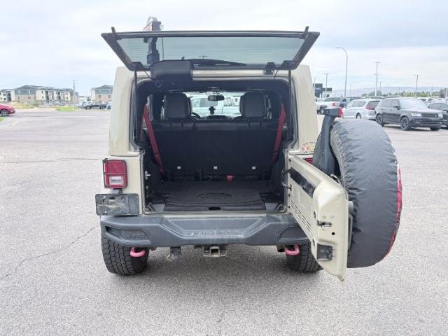 2018 TAN /Black, cloth Jeep Wrangler JK Unlimited Rubicon 4WD (1C4BJWFG4JL) with an 3.6L V6 DOHC 24V FFV engine, 6-Speed Automatic transmission, located at 1235 N Woodruff Ave., Idaho Falls, 83401, (208) 523-1053, 43.507172, -112.000488 - At Timberline Auto, finding a great deal on your next vehicle is always easy! Our experienced sales staff goal is to help find you the right vehicle at the right price! Our knowledgeable finance department has options for almost any credit score. We offer extended service contract options to prot- Photo#4