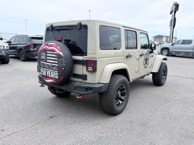 2018 TAN /Black, cloth Jeep Wrangler JK Unlimited Rubicon 4WD (1C4BJWFG4JL) with an 3.6L V6 DOHC 24V FFV engine, 6-Speed Automatic transmission, located at 1235 N Woodruff Ave., Idaho Falls, 83401, (208) 523-1053, 43.507172, -112.000488 - At Timberline Auto, finding a great deal on your next vehicle is always easy! Our experienced sales staff goal is to help find you the right vehicle at the right price! Our knowledgeable finance department has options for almost any credit score. We offer extended service contract options to prot- Photo#6
