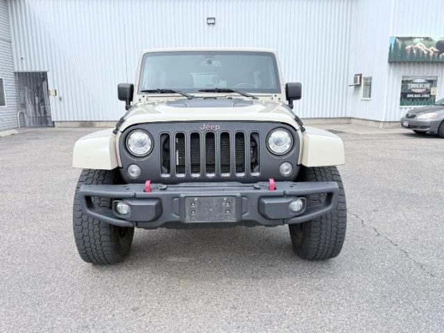 2018 TAN /Black, cloth Jeep Wrangler JK Unlimited Rubicon 4WD (1C4BJWFG4JL) with an 3.6L V6 DOHC 24V FFV engine, 6-Speed Automatic transmission, located at 1235 N Woodruff Ave., Idaho Falls, 83401, (208) 523-1053, 43.507172, -112.000488 - At Timberline Auto, finding a great deal on your next vehicle is always easy! Our experienced sales staff goal is to help find you the right vehicle at the right price! Our knowledgeable finance department has options for almost any credit score. We offer extended service contract options to prot- Photo#9