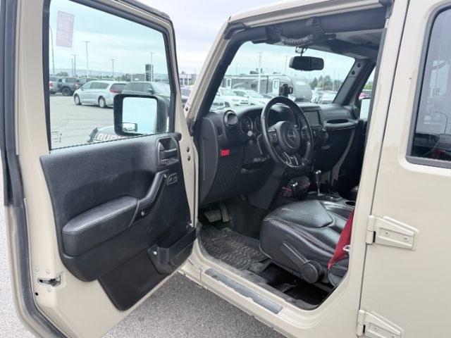 2018 TAN /Black, cloth Jeep Wrangler JK Unlimited Rubicon 4WD (1C4BJWFG4JL) with an 3.6L V6 DOHC 24V FFV engine, 6-Speed Automatic transmission, located at 1235 N Woodruff Ave., Idaho Falls, 83401, (208) 523-1053, 43.507172, -112.000488 - At Timberline Auto, finding a great deal on your next vehicle is always easy! Our experienced sales staff goal is to help find you the right vehicle at the right price! Our knowledgeable finance department has options for almost any credit score. We offer extended service contract options to prot- Photo#12