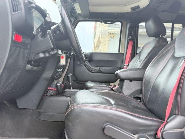 2018 TAN /Black, cloth Jeep Wrangler JK Unlimited Rubicon 4WD (1C4BJWFG4JL) with an 3.6L V6 DOHC 24V FFV engine, 6-Speed Automatic transmission, located at 1235 N Woodruff Ave., Idaho Falls, 83401, (208) 523-1053, 43.507172, -112.000488 - At Timberline Auto, finding a great deal on your next vehicle is always easy! Our experienced sales staff goal is to help find you the right vehicle at the right price! Our knowledgeable finance department has options for almost any credit score. We offer extended service contract options to prot- Photo#13