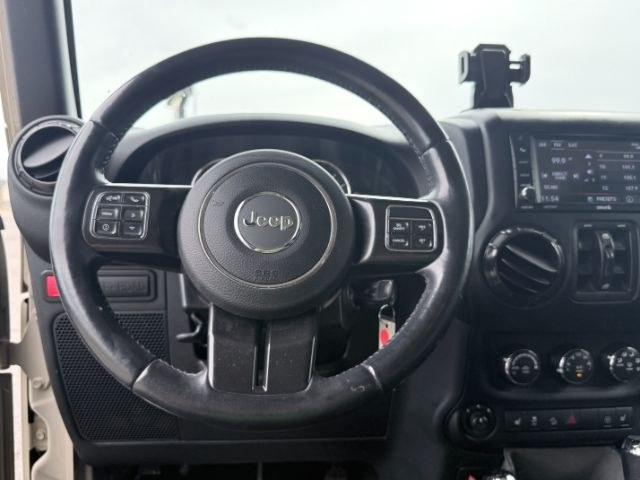 2018 TAN /Black, cloth Jeep Wrangler JK Unlimited Rubicon 4WD (1C4BJWFG4JL) with an 3.6L V6 DOHC 24V FFV engine, 6-Speed Automatic transmission, located at 1235 N Woodruff Ave., Idaho Falls, 83401, (208) 523-1053, 43.507172, -112.000488 - At Timberline Auto, finding a great deal on your next vehicle is always easy! Our experienced sales staff goal is to help find you the right vehicle at the right price! Our knowledgeable finance department has options for almost any credit score. We offer extended service contract options to prot- Photo#15