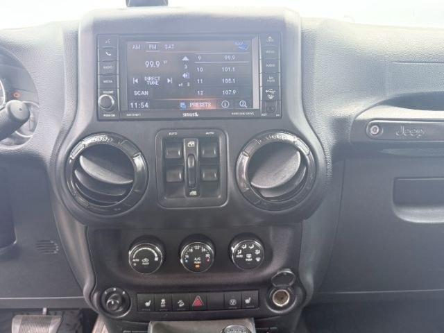 2018 TAN /Black, cloth Jeep Wrangler JK Unlimited Rubicon 4WD (1C4BJWFG4JL) with an 3.6L V6 DOHC 24V FFV engine, 6-Speed Automatic transmission, located at 1235 N Woodruff Ave., Idaho Falls, 83401, (208) 523-1053, 43.507172, -112.000488 - At Timberline Auto, finding a great deal on your next vehicle is always easy! Our experienced sales staff goal is to help find you the right vehicle at the right price! Our knowledgeable finance department has options for almost any credit score. We offer extended service contract options to prot- Photo#16