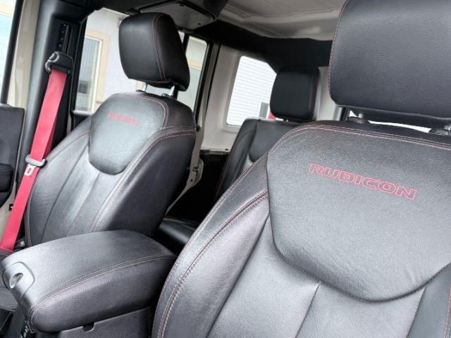 2018 TAN /Black, cloth Jeep Wrangler JK Unlimited Rubicon 4WD (1C4BJWFG4JL) with an 3.6L V6 DOHC 24V FFV engine, 6-Speed Automatic transmission, located at 1235 N Woodruff Ave., Idaho Falls, 83401, (208) 523-1053, 43.507172, -112.000488 - At Timberline Auto, finding a great deal on your next vehicle is always easy! Our experienced sales staff goal is to help find you the right vehicle at the right price! Our knowledgeable finance department has options for almost any credit score. We offer extended service contract options to prot- Photo#21