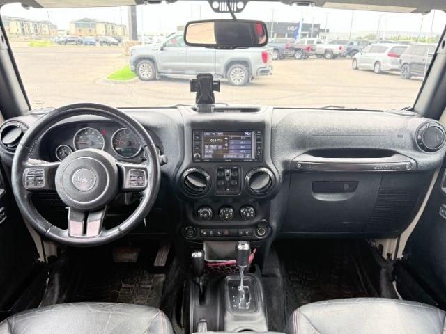 2018 TAN /Black, cloth Jeep Wrangler JK Unlimited Rubicon 4WD (1C4BJWFG4JL) with an 3.6L V6 DOHC 24V FFV engine, 6-Speed Automatic transmission, located at 1235 N Woodruff Ave., Idaho Falls, 83401, (208) 523-1053, 43.507172, -112.000488 - At Timberline Auto, finding a great deal on your next vehicle is always easy! Our experienced sales staff goal is to help find you the right vehicle at the right price! Our knowledgeable finance department has options for almost any credit score. We offer extended service contract options to prot- Photo#23