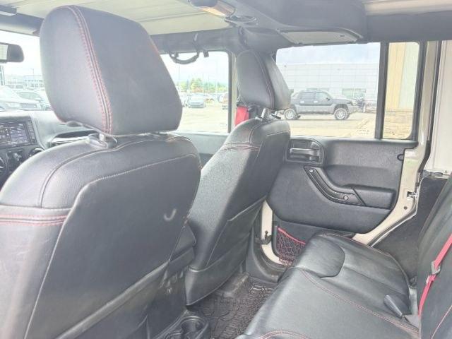 2018 TAN /Black, cloth Jeep Wrangler JK Unlimited Rubicon 4WD (1C4BJWFG4JL) with an 3.6L V6 DOHC 24V FFV engine, 6-Speed Automatic transmission, located at 1235 N Woodruff Ave., Idaho Falls, 83401, (208) 523-1053, 43.507172, -112.000488 - At Timberline Auto, finding a great deal on your next vehicle is always easy! Our experienced sales staff goal is to help find you the right vehicle at the right price! Our knowledgeable finance department has options for almost any credit score. We offer extended service contract options to prot- Photo#25