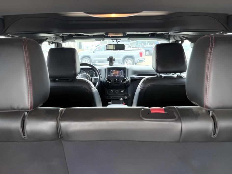 2018 TAN /Black Jeep Wrangler Rubicon (1C4BJWFG4JL) with an V6, 3.6L engine, 6-speed manual transmission, located at 1175 N Woodruff Ave, Idaho Falls, ID, 83401, 43.506901, -111.999657 - <b>Vehicle Details</b><br>Adventure-ready and built to conquer, this 2018 Jeep Wrangler Unlimited Rubicon in Idaho Falls, ID delivers legendary off-road capability with rugged style and everyday comfort. Powered by a strong V6, 3.6L gasoline engine and equipped with 4WD, this Jeep Wrangler is engine- Photo#31