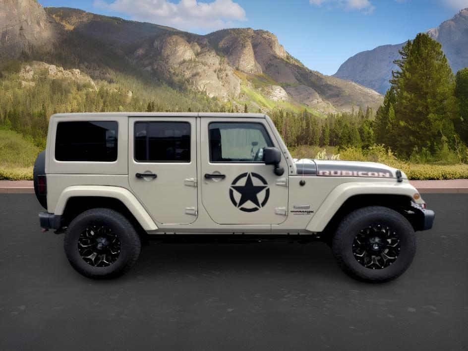 2018 TAN /Black Jeep Wrangler Rubicon (1C4BJWFG4JL) with an V6, 3.6L engine, 6-speed manual transmission, located at 1175 N Woodruff Ave, Idaho Falls, ID, 83401, 43.506901, -111.999657 - <b>Vehicle Details</b><br>Adventure-ready and built to conquer, this 2018 Jeep Wrangler Unlimited Rubicon in Idaho Falls, ID delivers legendary off-road capability with rugged style and everyday comfort. Powered by a strong V6, 3.6L gasoline engine and equipped with 4WD, this Jeep Wrangler is engine- Photo#33