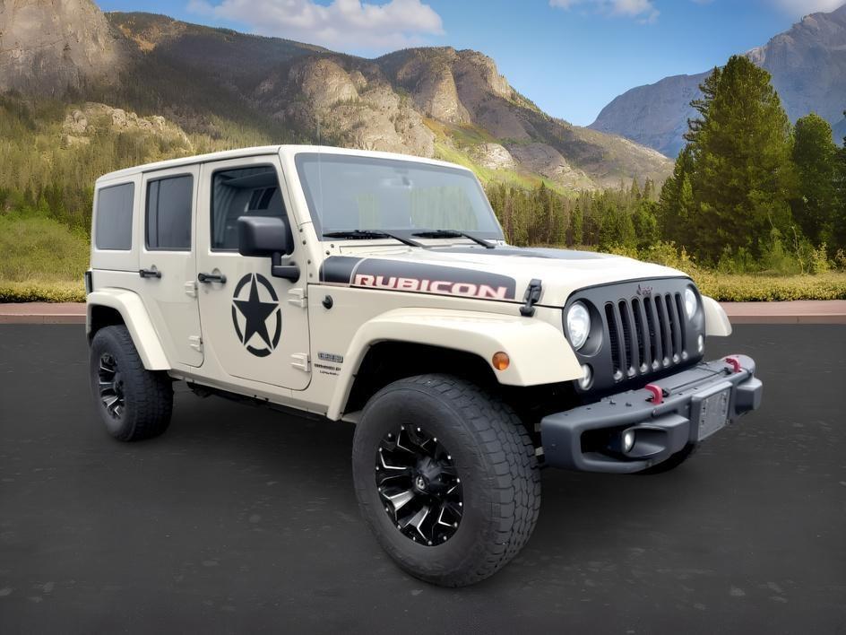 2018 TAN /Black Jeep Wrangler Rubicon (1C4BJWFG4JL) with an V6, 3.6L engine, 6-speed manual transmission, located at 1175 N Woodruff Ave, Idaho Falls, ID, 83401, 43.506901, -111.999657 - <b>Vehicle Details</b><br>Adventure-ready and built to conquer, this 2018 Jeep Wrangler Unlimited Rubicon in Idaho Falls, ID delivers legendary off-road capability with rugged style and everyday comfort. Powered by a strong V6, 3.6L gasoline engine and equipped with 4WD, this Jeep Wrangler is engine- Photo#34