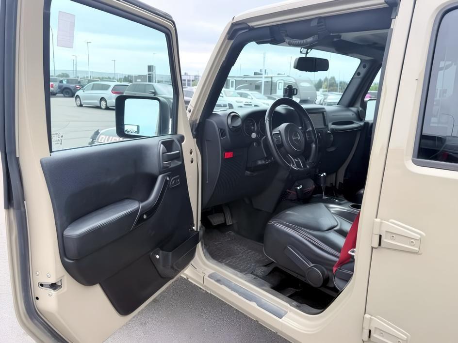 2018 TAN /Black Jeep Wrangler Rubicon (1C4BJWFG4JL) with an V6, 3.6L engine, 6-speed manual transmission, located at 1175 N Woodruff Ave, Idaho Falls, ID, 83401, 43.506901, -111.999657 - <b>Vehicle Details</b><br>Adventure-ready and built to conquer, this 2018 Jeep Wrangler Unlimited Rubicon in Idaho Falls, ID delivers legendary off-road capability with rugged style and everyday comfort. Powered by a strong V6, 3.6L gasoline engine and equipped with 4WD, this Jeep Wrangler is engine- Photo#38
