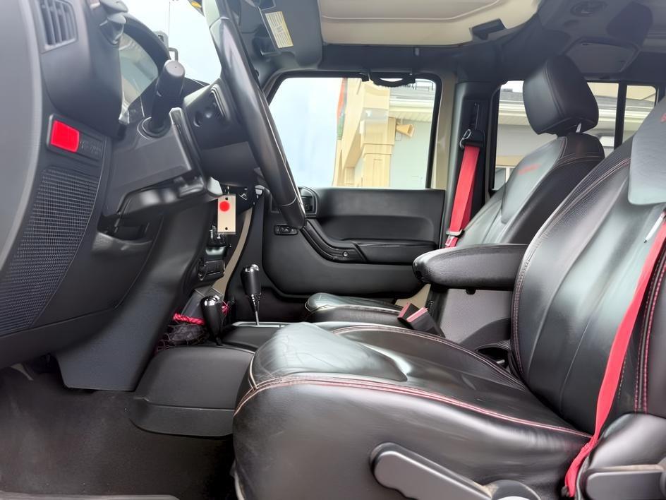 2018 TAN /Black Jeep Wrangler Rubicon (1C4BJWFG4JL) with an V6, 3.6L engine, 6-speed manual transmission, located at 1175 N Woodruff Ave, Idaho Falls, ID, 83401, 43.506901, -111.999657 - <b>Vehicle Details</b><br>Adventure-ready and built to conquer, this 2018 Jeep Wrangler Unlimited Rubicon in Idaho Falls, ID delivers legendary off-road capability with rugged style and everyday comfort. Powered by a strong V6, 3.6L gasoline engine and equipped with 4WD, this Jeep Wrangler is engine- Photo#39