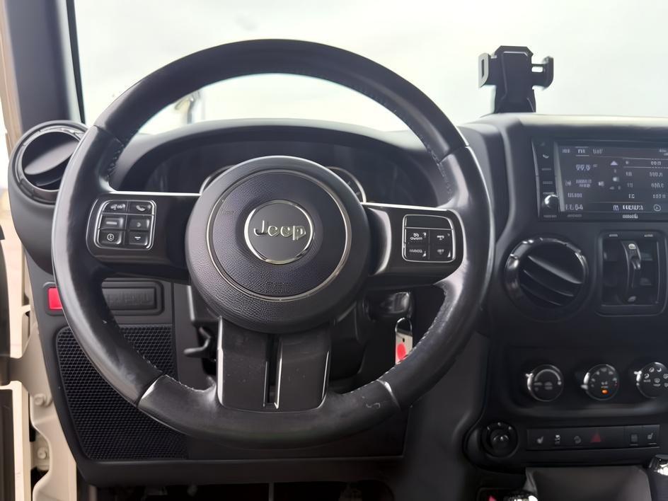 2018 TAN /Black Jeep Wrangler Rubicon (1C4BJWFG4JL) with an V6, 3.6L engine, 6-speed manual transmission, located at 1175 N Woodruff Ave, Idaho Falls, ID, 83401, 43.506901, -111.999657 - <b>Vehicle Details</b><br>Adventure-ready and built to conquer, this 2018 Jeep Wrangler Unlimited Rubicon in Idaho Falls, ID delivers legendary off-road capability with rugged style and everyday comfort. Powered by a strong V6, 3.6L gasoline engine and equipped with 4WD, this Jeep Wrangler is engine- Photo#41