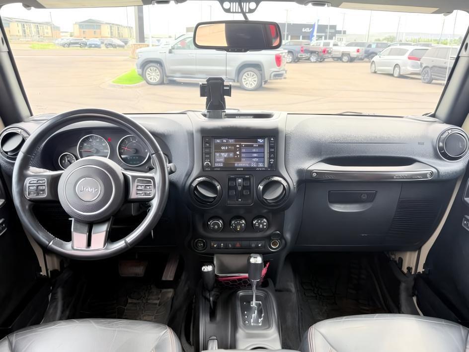 2018 TAN /Black Jeep Wrangler Rubicon (1C4BJWFG4JL) with an V6, 3.6L engine, 6-speed manual transmission, located at 1175 N Woodruff Ave, Idaho Falls, ID, 83401, 43.506901, -111.999657 - <b>Vehicle Details</b><br>Adventure-ready and built to conquer, this 2018 Jeep Wrangler Unlimited Rubicon in Idaho Falls, ID delivers legendary off-road capability with rugged style and everyday comfort. Powered by a strong V6, 3.6L gasoline engine and equipped with 4WD, this Jeep Wrangler is engine- Photo#49