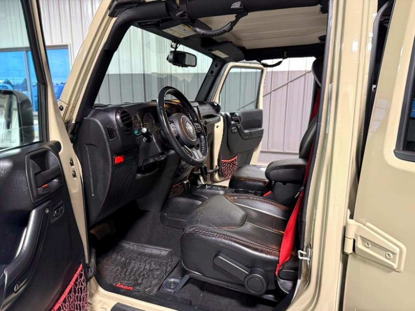 2018 TAN /Black, leather Jeep Wrangler JK (1C4BJWFG4JL) with an 36L V6 DOHC 24V FFV engine, Automatic transmission, located at 1175 N Woodruff Ave, Idaho Falls, ID, 83401, 43.506901, -111.999657 - At Timberline Auto, finding a great deal on your next vehicle is always easy! Our experienced sales staff's goal is to help find you the right vehicle at the right price! Our knowledgeable finance department has options for almost any credit score. We offer extended service contract options to prote - Photo#11