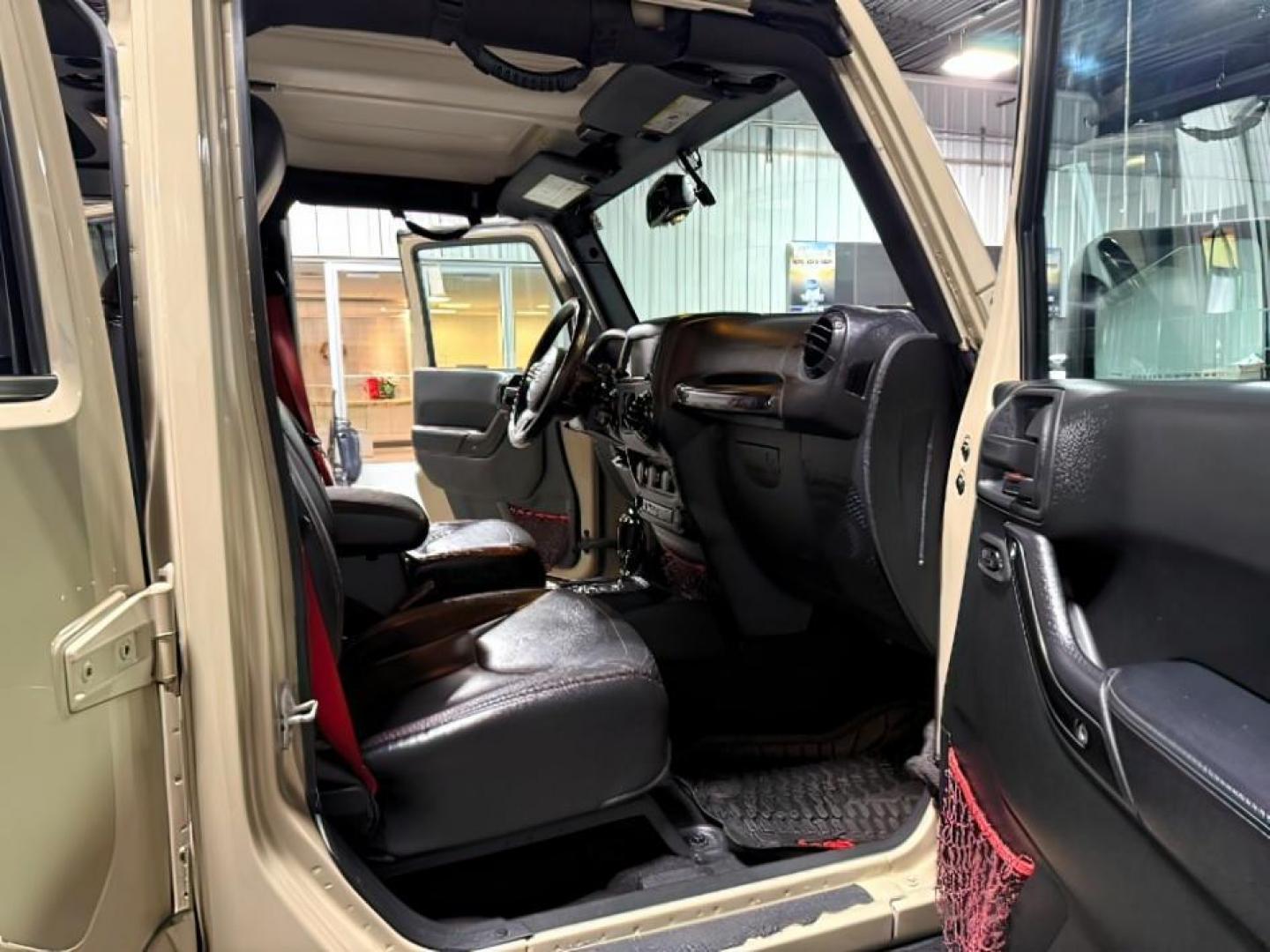 2018 TAN /Black, leather Jeep Wrangler JK (1C4BJWFG4JL) with an 36L V6 DOHC 24V FFV engine, Automatic transmission, located at 1175 N Woodruff Ave, Idaho Falls, ID, 83401, 43.506901, -111.999657 - At Timberline Auto, finding a great deal on your next vehicle is always easy! Our experienced sales staff's goal is to help find you the right vehicle at the right price! Our knowledgeable finance department has options for almost any credit score. We offer extended service contract options to prote - Photo#12