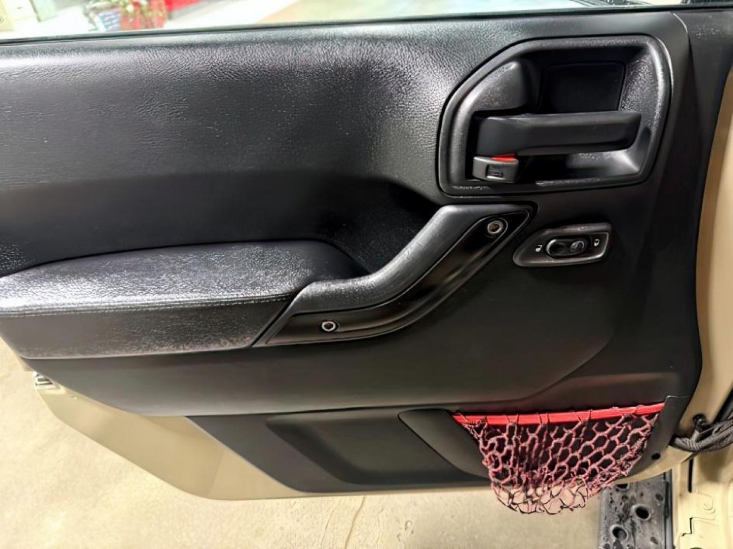 2018 TAN /Black, leather Jeep Wrangler JK (1C4BJWFG4JL) with an 36L V6 DOHC 24V FFV engine, Automatic transmission, located at 1175 N Woodruff Ave, Idaho Falls, ID, 83401, 43.506901, -111.999657 - At Timberline Auto, finding a great deal on your next vehicle is always easy! Our experienced sales staff's goal is to help find you the right vehicle at the right price! Our knowledgeable finance department has options for almost any credit score. We offer extended service contract options to prote - Photo#13