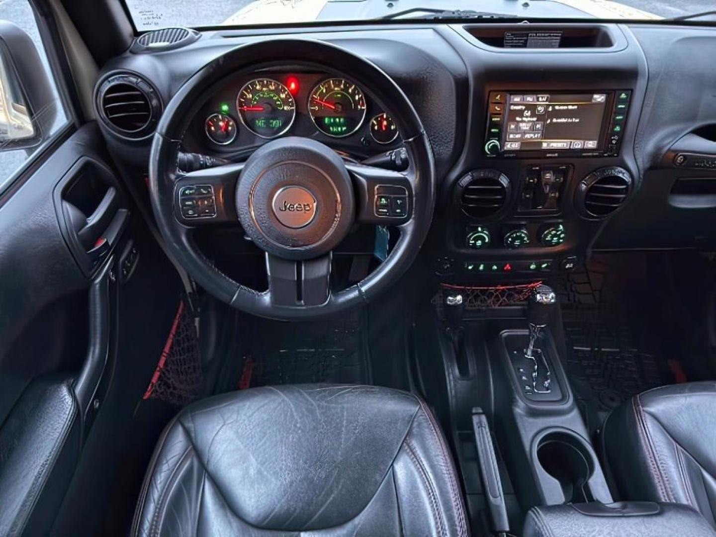 2018 TAN /Black, leather Jeep Wrangler JK (1C4BJWFG4JL) with an 36L V6 DOHC 24V FFV engine, Automatic transmission, located at 1175 N Woodruff Ave, Idaho Falls, ID, 83401, 43.506901, -111.999657 - At Timberline Auto, finding a great deal on your next vehicle is always easy! Our experienced sales staff's goal is to help find you the right vehicle at the right price! Our knowledgeable finance department has options for almost any credit score. We offer extended service contract options to prote - Photo#17