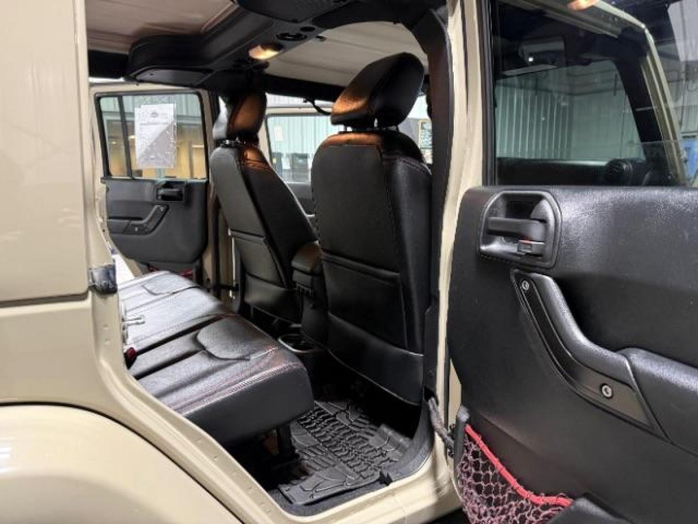 2018 TAN /Black, leather Jeep Wrangler JK Unlimited Rubicon 4WD (1C4BJWFG4JL) with an 3.6L V6 DOHC 24V FFV engine, 6-Speed Automatic transmission, located at 1235 N Woodruff Ave., Idaho Falls, 83401, (208) 523-1053, 43.507172, -112.000488 - At Timberline Auto, finding a great deal on your next vehicle is always easy! Our experienced sales staff's goal is to help find you the right vehicle at the right price! Our knowledgeable finance department has options for almost any credit score. We offer extended service contract options to prote - Photo#15