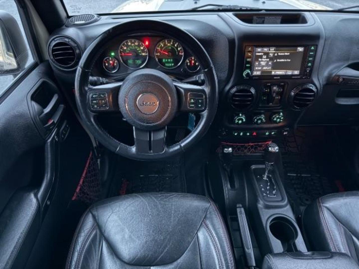 2018 TAN /Black, leather Jeep Wrangler JK Unlimited Rubicon 4WD (1C4BJWFG4JL) with an 3.6L V6 DOHC 24V FFV engine, 6-Speed Automatic transmission, located at 1235 N Woodruff Ave., Idaho Falls, 83401, (208) 523-1053, 43.507172, -112.000488 - At Timberline Auto, finding a great deal on your next vehicle is always easy! Our experienced sales staff's goal is to help find you the right vehicle at the right price! Our knowledgeable finance department has options for almost any credit score. We offer extended service contract options to prote - Photo#17
