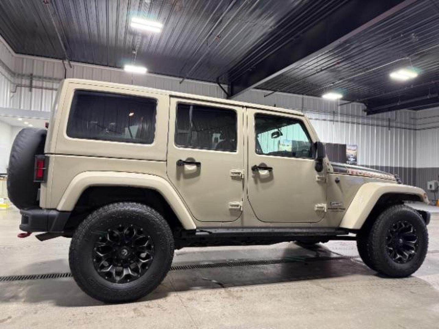 2018 TAN /Black, leather Jeep Wrangler JK Unlimited Rubicon 4WD (1C4BJWFG4JL) with an 3.6L V6 DOHC 24V FFV engine, 6-Speed Automatic transmission, located at 1235 N Woodruff Ave., Idaho Falls, 83401, (208) 523-1053, 43.507172, -112.000488 - At Timberline Auto, finding a great deal on your next vehicle is always easy! Our experienced sales staff's goal is to help find you the right vehicle at the right price! Our knowledgeable finance department has options for almost any credit score. We offer extended service contract options to prote - Photo#5
