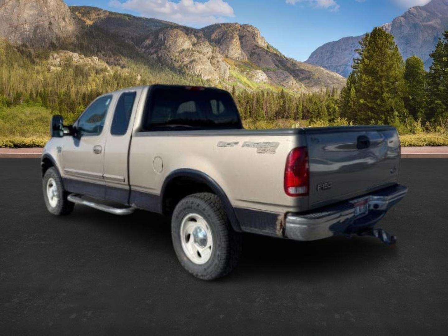 2001 GOLD /CLOTH Ford F-150 (1FTRX18L61N) with an 54 engine, Automatic transmission, located at 1175 N Woodruff Ave, Idaho Falls, ID, 83401, 43.506901, -111.999657 - At Timberline Auto, finding a great deal on your next vehicle is always easy! Our experienced sales staff's goal is to help find you the right vehicle at the right price! Our knowledgeable finance department has options for almost any credit score. We offer extended service contract options to prote - Photo#2