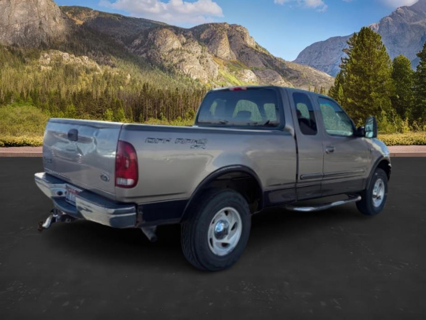 2001 GOLD /CLOTH Ford F-150 (1FTRX18L61N) with an 54 engine, Automatic transmission, located at 1175 N Woodruff Ave, Idaho Falls, ID, 83401, 43.506901, -111.999657 - At Timberline Auto, finding a great deal on your next vehicle is always easy! Our experienced sales staff's goal is to help find you the right vehicle at the right price! Our knowledgeable finance department has options for almost any credit score. We offer extended service contract options to prote - Photo#4