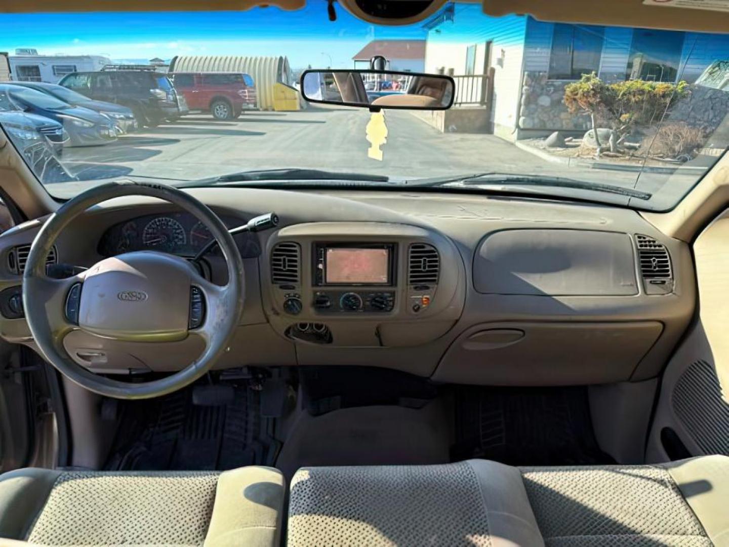 2001 GOLD /CLOTH Ford F-150 (1FTRX18L61N) with an 54 engine, Automatic transmission, located at 1175 N Woodruff Ave, Idaho Falls, ID, 83401, 43.506901, -111.999657 - At Timberline Auto, finding a great deal on your next vehicle is always easy! Our experienced sales staff's goal is to help find you the right vehicle at the right price! Our knowledgeable finance department has options for almost any credit score. We offer extended service contract options to prote - Photo#12