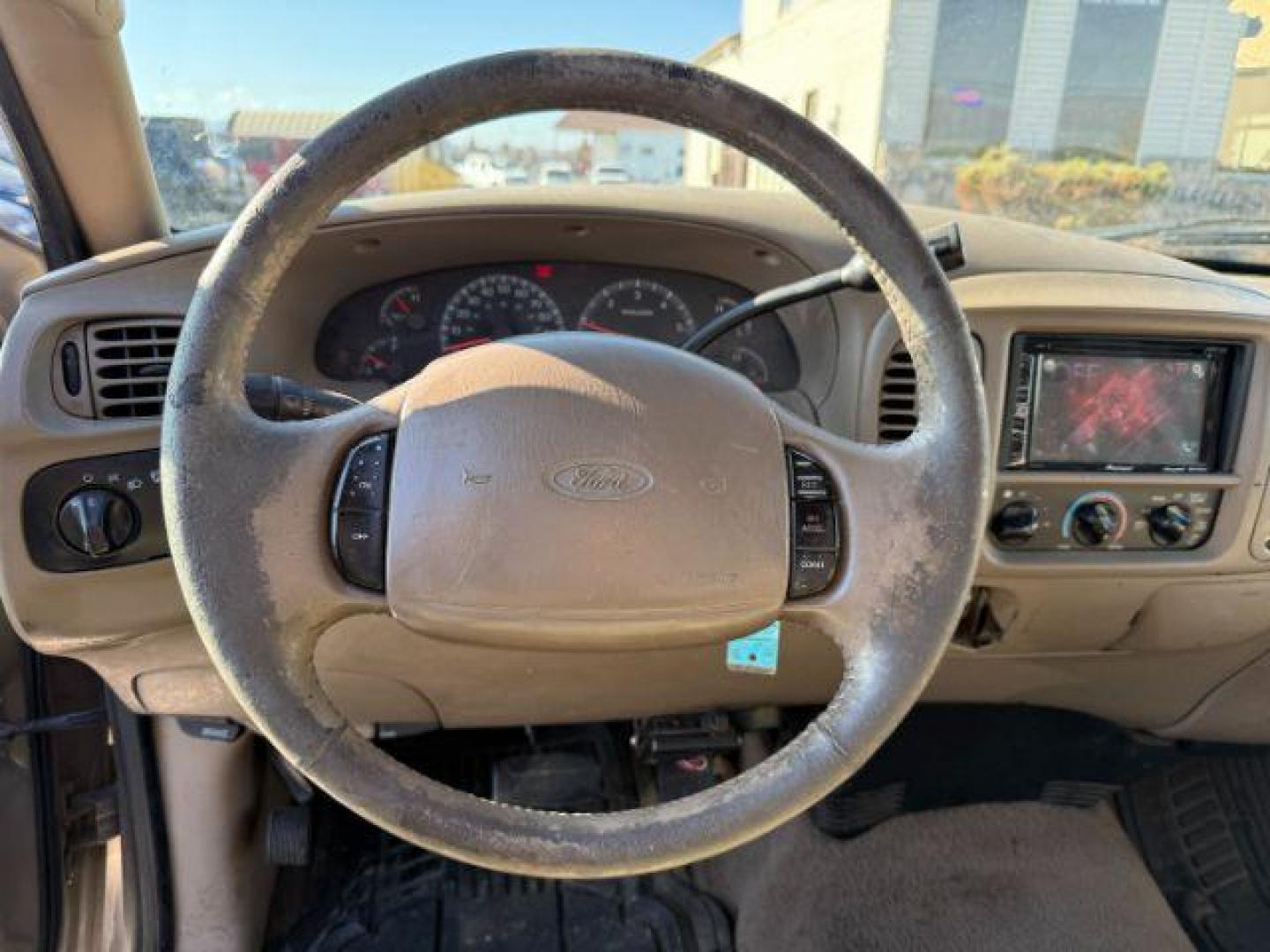2001 GOLD /CLOTH Ford F-150 XLT SuperCab Short Bed 4WD (1FTRX18L61N) with an 5.4 engine, AUTOMATIC transmission, located at 1235 N Woodruff Ave., Idaho Falls, 83401, (208) 523-1053, 43.507172, -112.000488 - At Timberline Auto, finding a great deal on your next vehicle is always easy! Our experienced sales staff's goal is to help find you the right vehicle at the right price! Our knowledgeable finance department has options for almost any credit score. We offer extended service contract options to prote - Photo#9