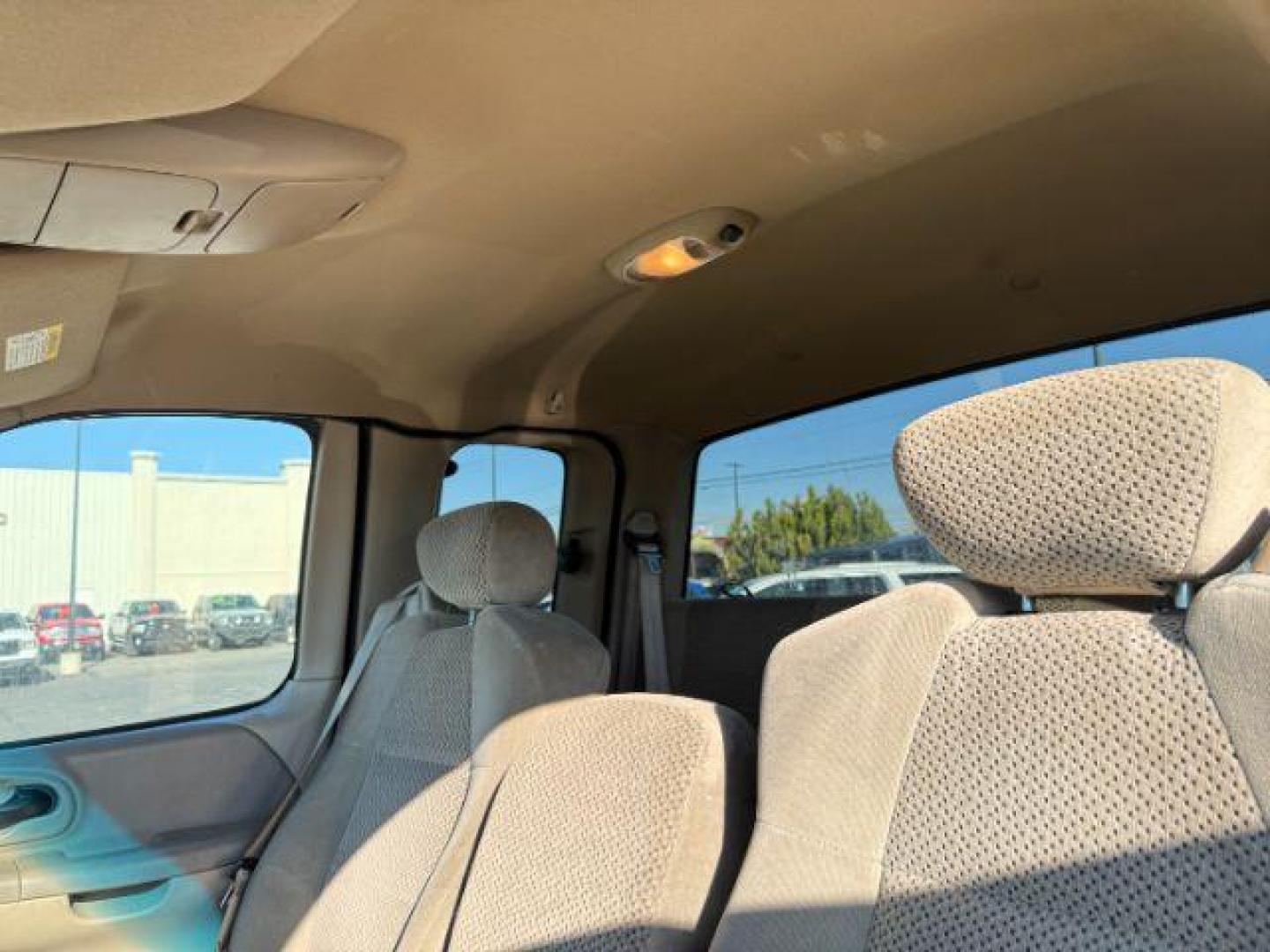2001 GOLD /CLOTH Ford F-150 XLT SuperCab Short Bed 4WD (1FTRX18L61N) with an 5.4 engine, AUTOMATIC transmission, located at 1235 N Woodruff Ave., Idaho Falls, 83401, (208) 523-1053, 43.507172, -112.000488 - At Timberline Auto, finding a great deal on your next vehicle is always easy! Our experienced sales staff's goal is to help find you the right vehicle at the right price! Our knowledgeable finance department has options for almost any credit score. We offer extended service contract options to prote - Photo#11