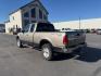 2001 GOLD /CLOTH Ford F-150 XLT SuperCab Short Bed 4WD (1FTRX18L61N) with an 5.4 engine, AUTOMATIC transmission, located at 1235 N Woodruff Ave., Idaho Falls, 83401, (208) 523-1053, 43.507172, -112.000488 - At Timberline Auto, finding a great deal on your next vehicle is always easy! Our experienced sales staff's goal is to help find you the right vehicle at the right price! Our knowledgeable finance department has options for almost any credit score. We offer extended service contract options to prote - Photo#2
