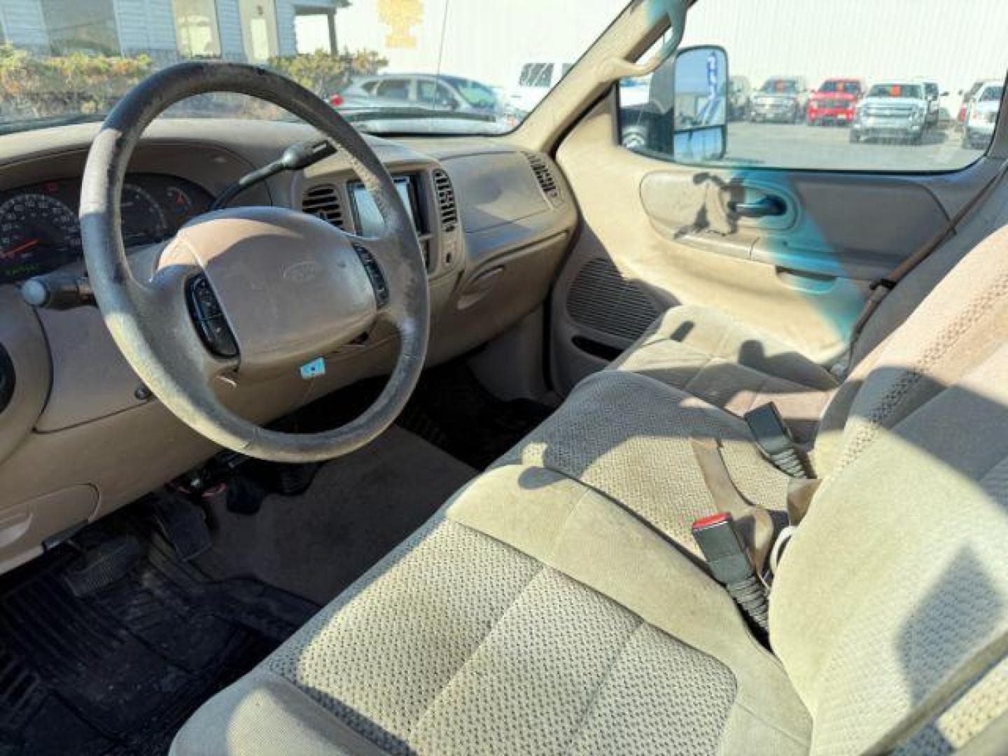 2001 GOLD /CLOTH Ford F-150 XLT SuperCab Short Bed 4WD (1FTRX18L61N) with an 5.4 engine, AUTOMATIC transmission, located at 1235 N Woodruff Ave., Idaho Falls, 83401, (208) 523-1053, 43.507172, -112.000488 - At Timberline Auto, finding a great deal on your next vehicle is always easy! Our experienced sales staff's goal is to help find you the right vehicle at the right price! Our knowledgeable finance department has options for almost any credit score. We offer extended service contract options to prote - Photo#8