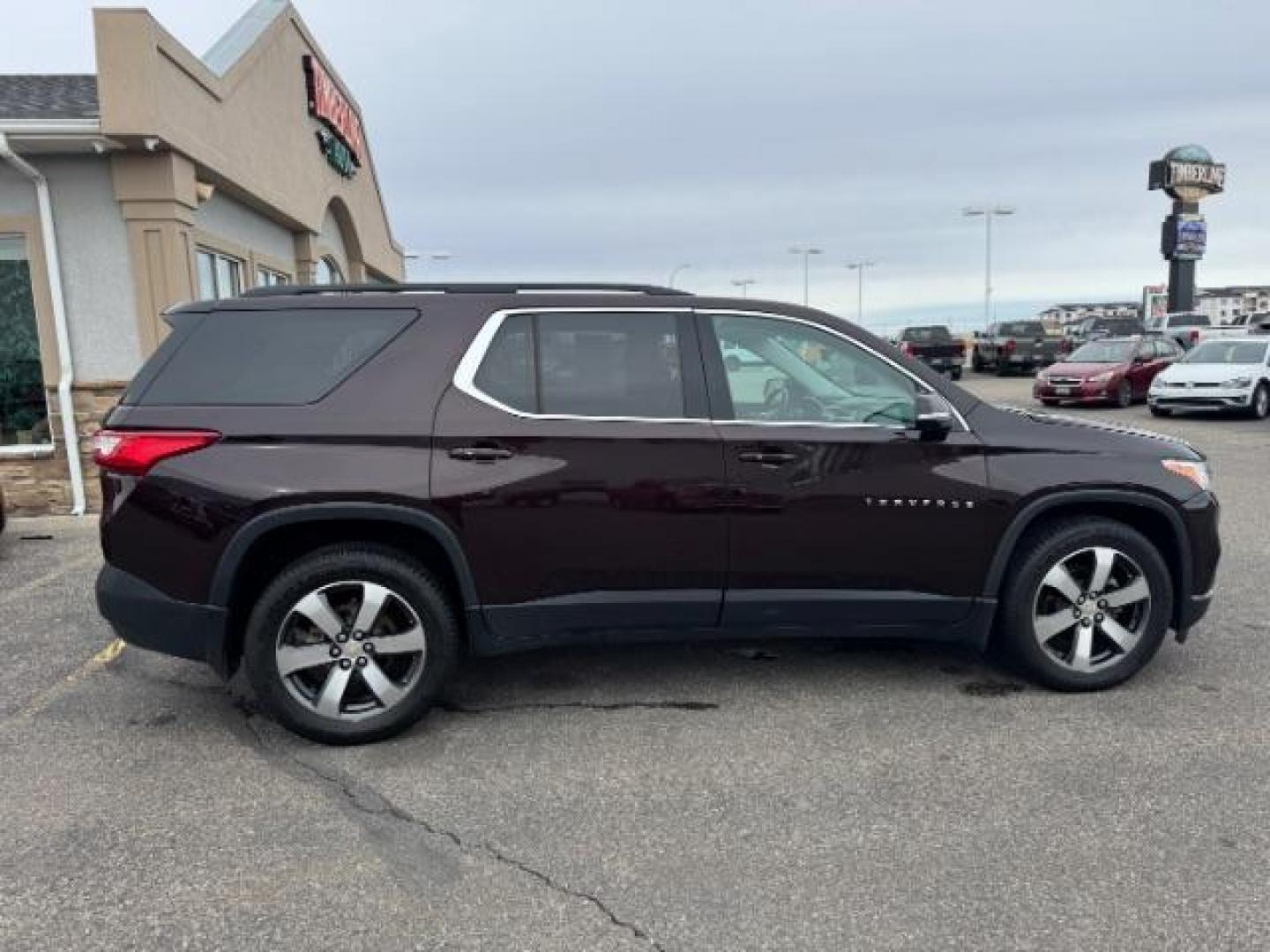 2020 Black Cherry Metallic /Jet Black, leather Chevrolet Traverse LT Feather AWD (1GNEVHKW8LJ) with an 3.6L V6 DOHC 24V engine, 9-Speed Automatic transmission, located at 1235 N Woodruff Ave., Idaho Falls, 83401, (208) 523-1053, 43.507172, -112.000488 - At Timberline Auto, finding a great deal on your next vehicle is always easy! Our experienced sales staff's goal is to help find you the right vehicle at the right price! Our knowledgeable finance department has options for almost any credit score. We offer extended service contract options to prote - Photo#3