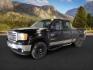 2013 Onyx Black /Ebony Leather Interior GMC Sierra 2500HD SLT Crew Cab 4WD (1GT121E86DF) with an 6.6L V8 OHV 32V TURBO DIESEL engine, 6-Speed Automatic transmission, located at 1235 N Woodruff Ave., Idaho Falls, 83401, (208) 523-1053, 43.507172, -112.000488 - At Timberline Auto, finding a great deal on your next vehicle is always easy! Our experienced sales staff's goal is to help find you the right vehicle at the right price! Our knowledgeable finance department has options for almost any credit score. We offer extended service contract options to prote - Photo#0