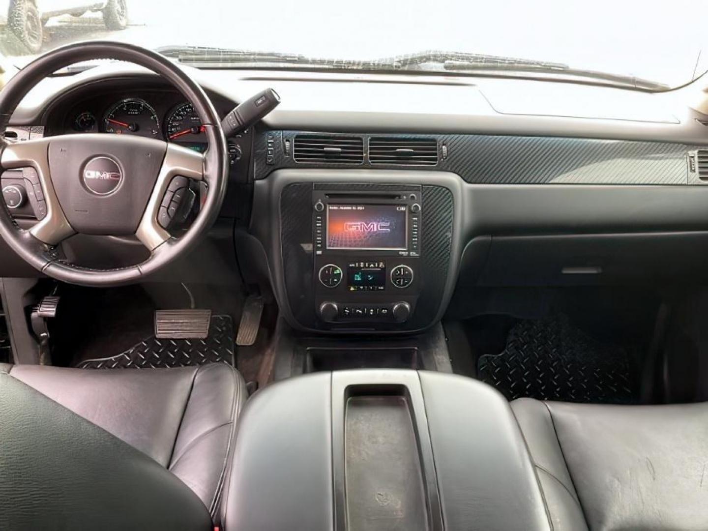 2013 Onyx Black /Ebony Leather Interior GMC Sierra 2500HD SLT Crew Cab 4WD (1GT121E86DF) with an 6.6L V8 OHV 32V TURBO DIESEL engine, 6-Speed Automatic transmission, located at 1235 N Woodruff Ave., Idaho Falls, 83401, (208) 523-1053, 43.507172, -112.000488 - At Timberline Auto, finding a great deal on your next vehicle is always easy! Our experienced sales staff's goal is to help find you the right vehicle at the right price! Our knowledgeable finance department has options for almost any credit score. We offer extended service contract options to prote - Photo#14