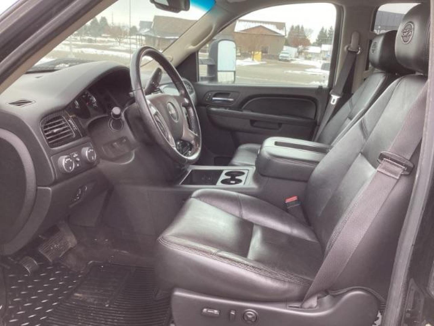 2013 Onyx Black /Ebony Leather Interior GMC Sierra 2500HD SLT Crew Cab 4WD (1GT121E86DF) with an 6.6L V8 OHV 32V TURBO DIESEL engine, 6-Speed Automatic transmission, located at 1235 N Woodruff Ave., Idaho Falls, 83401, (208) 523-1053, 43.507172, -112.000488 - At Timberline Auto, finding a great deal on your next vehicle is always easy! Our experienced sales staff's goal is to help find you the right vehicle at the right price! Our knowledgeable finance department has options for almost any credit score. We offer extended service contract options to prote - Photo#12